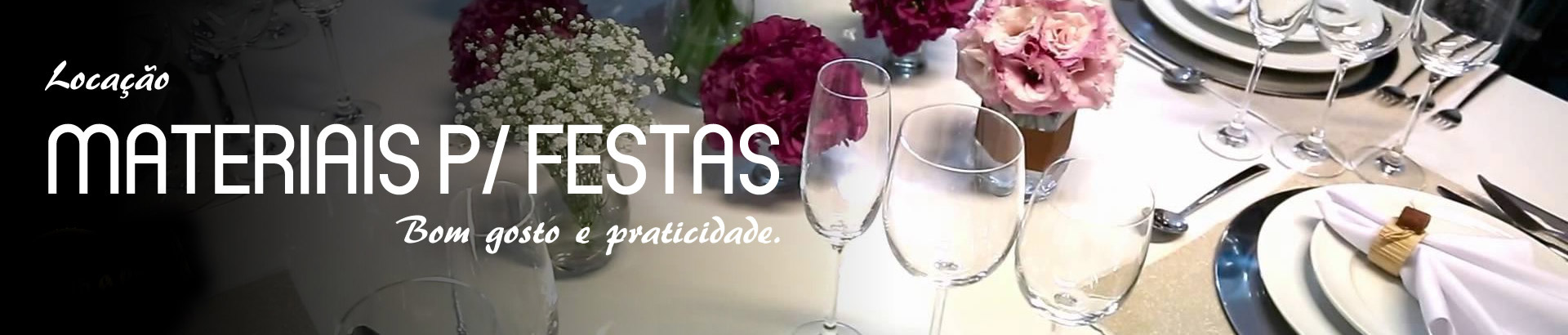 Mesa posta com taças, pratos e arranjos de flores